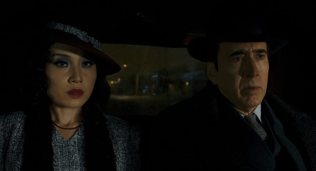 Li Jun Li y Nicolas Cage